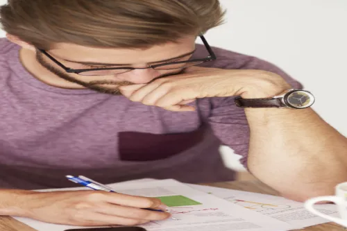  high-angle-view-man-working-documents